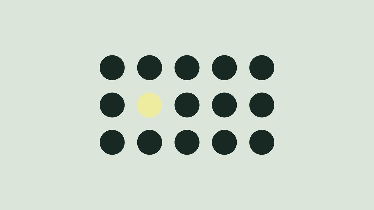 Fifteen dark dots in a grid, one of them yellow