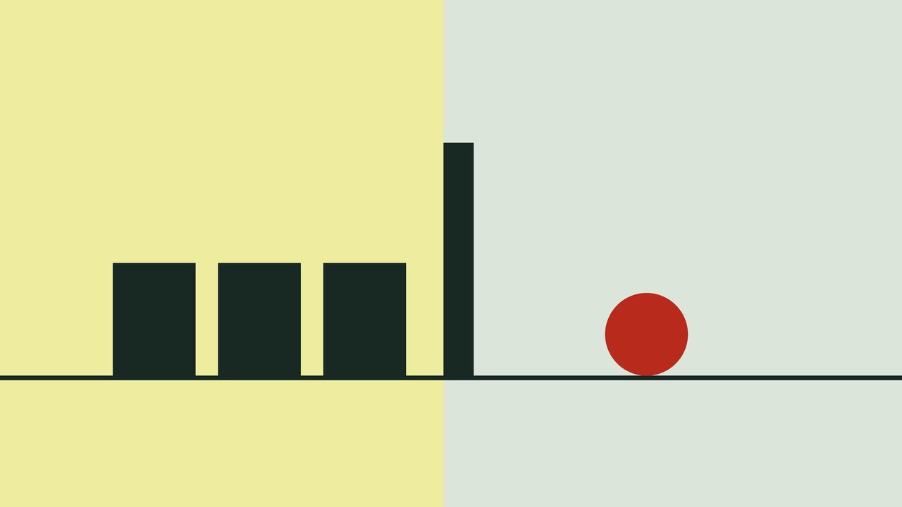 Dark blocks of the same size on a yellow field behind a tall dark wall, and a red ball alone on the pale green side.